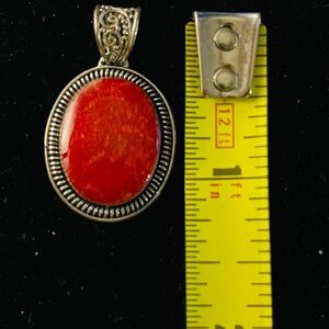 Sponge red coral pendant in Sterling Silver setting.